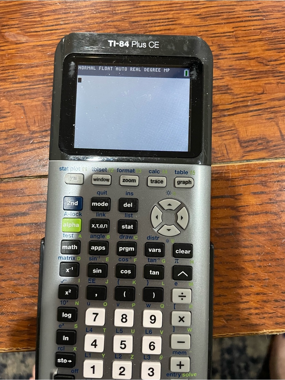 Texas Instruments TI-84 Plus CE Graphing Calculator in Black and Silver